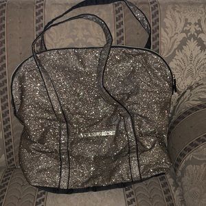 Victoria’s Secret over night/duffel bag.